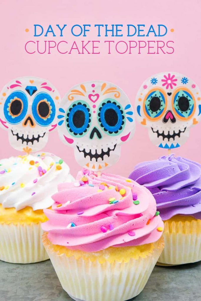 Three colorful cupcakes with Day of the Dead (Dia de los Muertos) Sugar Skull Cupcake Toppers