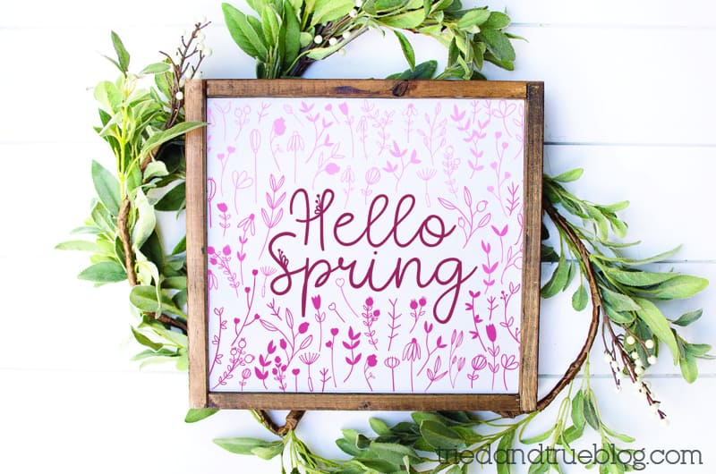 Hello Spring Free SVG on a wood panel.