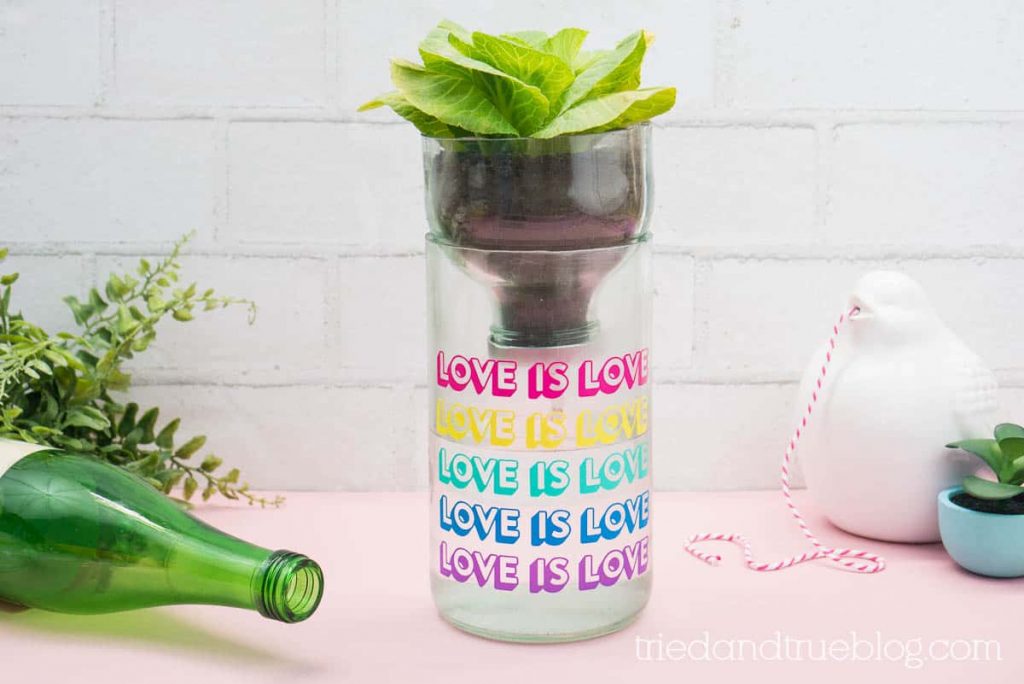 Recycled Self Watering Planter with the words 