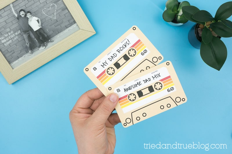 Hand holding Cassette Tape Father's Day Card Free Printable cards.