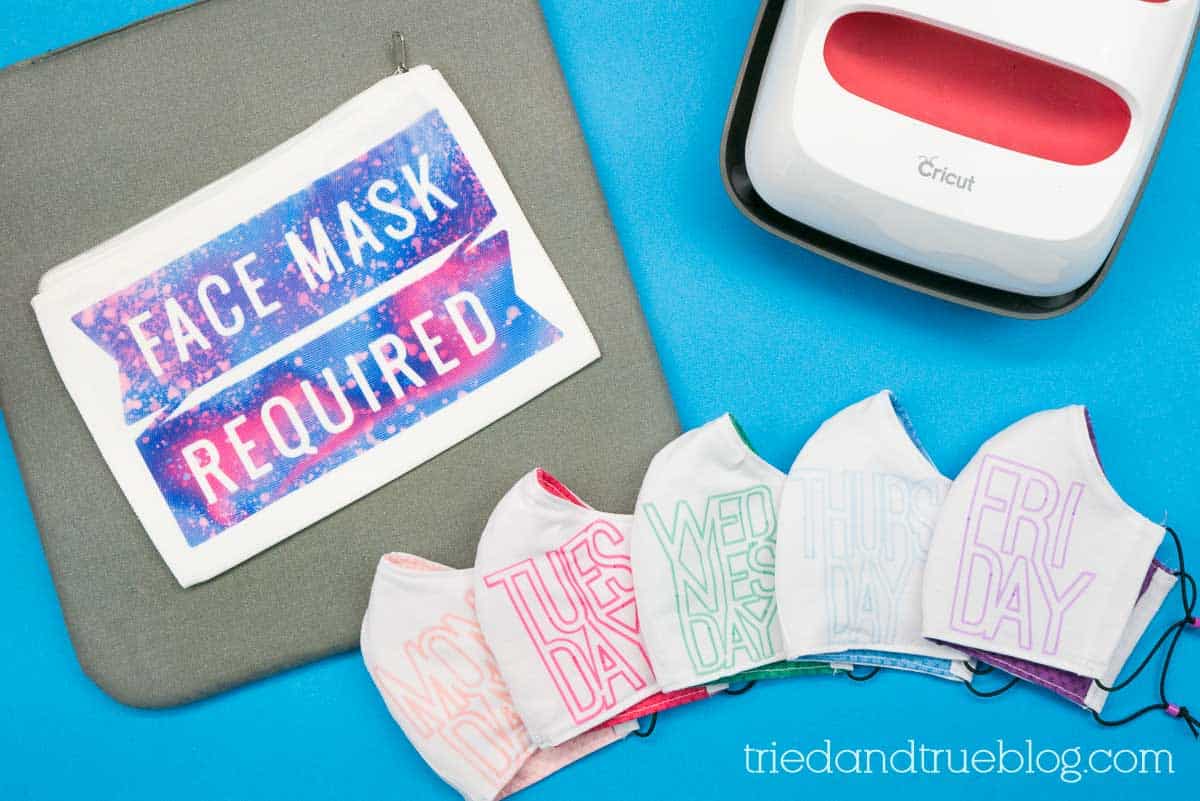 Five face masks with the days of the week printed on them.