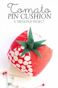 Keep track of your sewing pins with this adorable Quilted Tomato Pin Cushion! Includes free pattern to make it super easy to make!