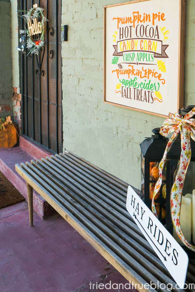Front porch with Thanksgiving decor and Reversible Halloween & Thanksgiving Cricut Vinyl Sign